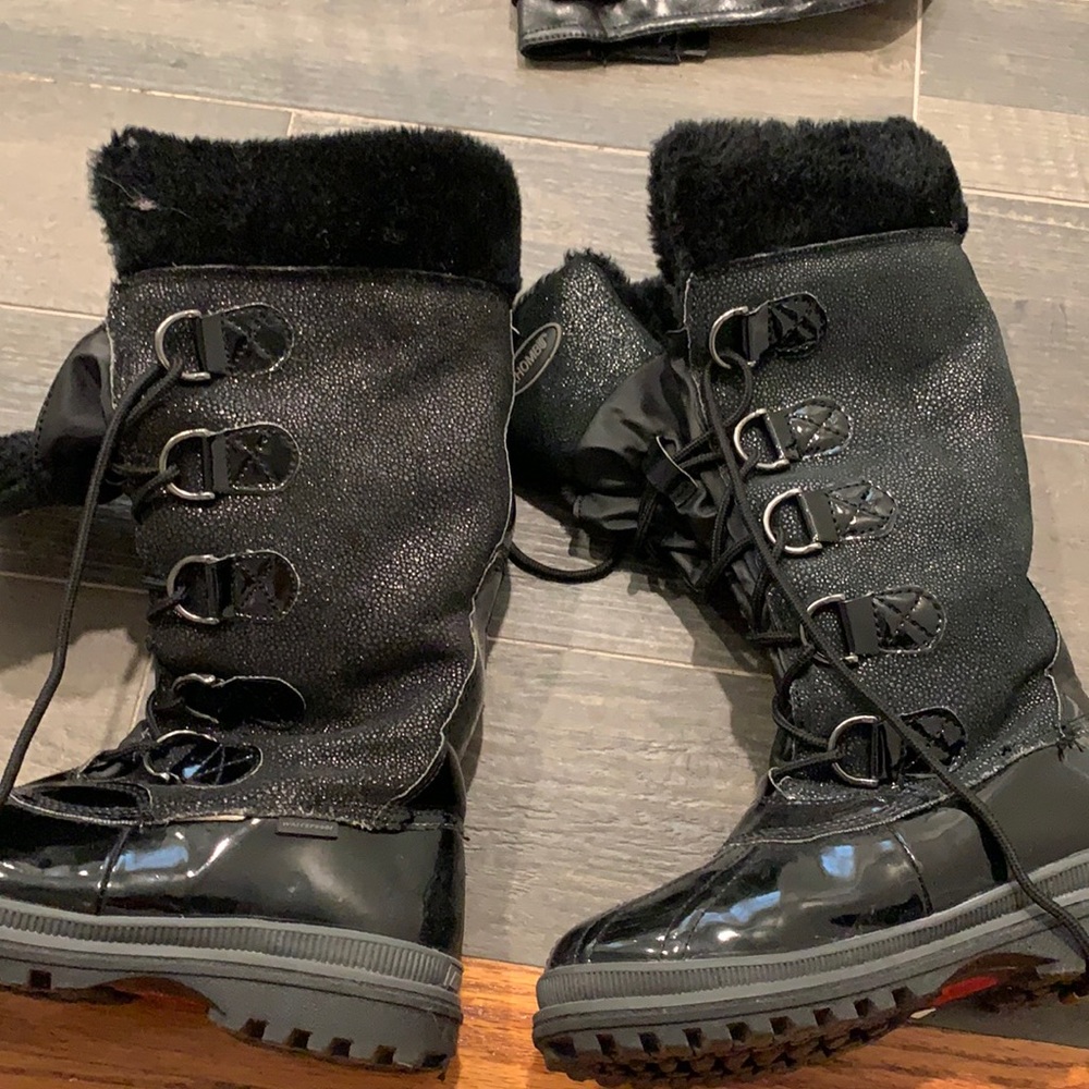 Black combat winter boots. Fuzzy on the inside
